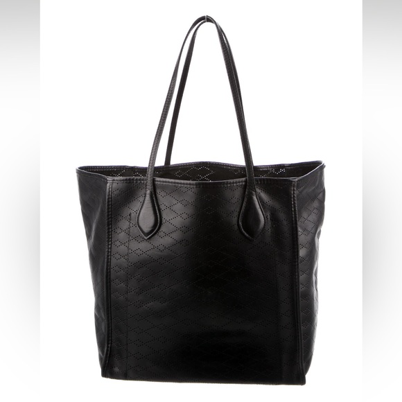 Berlin leather tote with skull tag/mirror along with detachable zipper pouch. - Picture 1 of 12